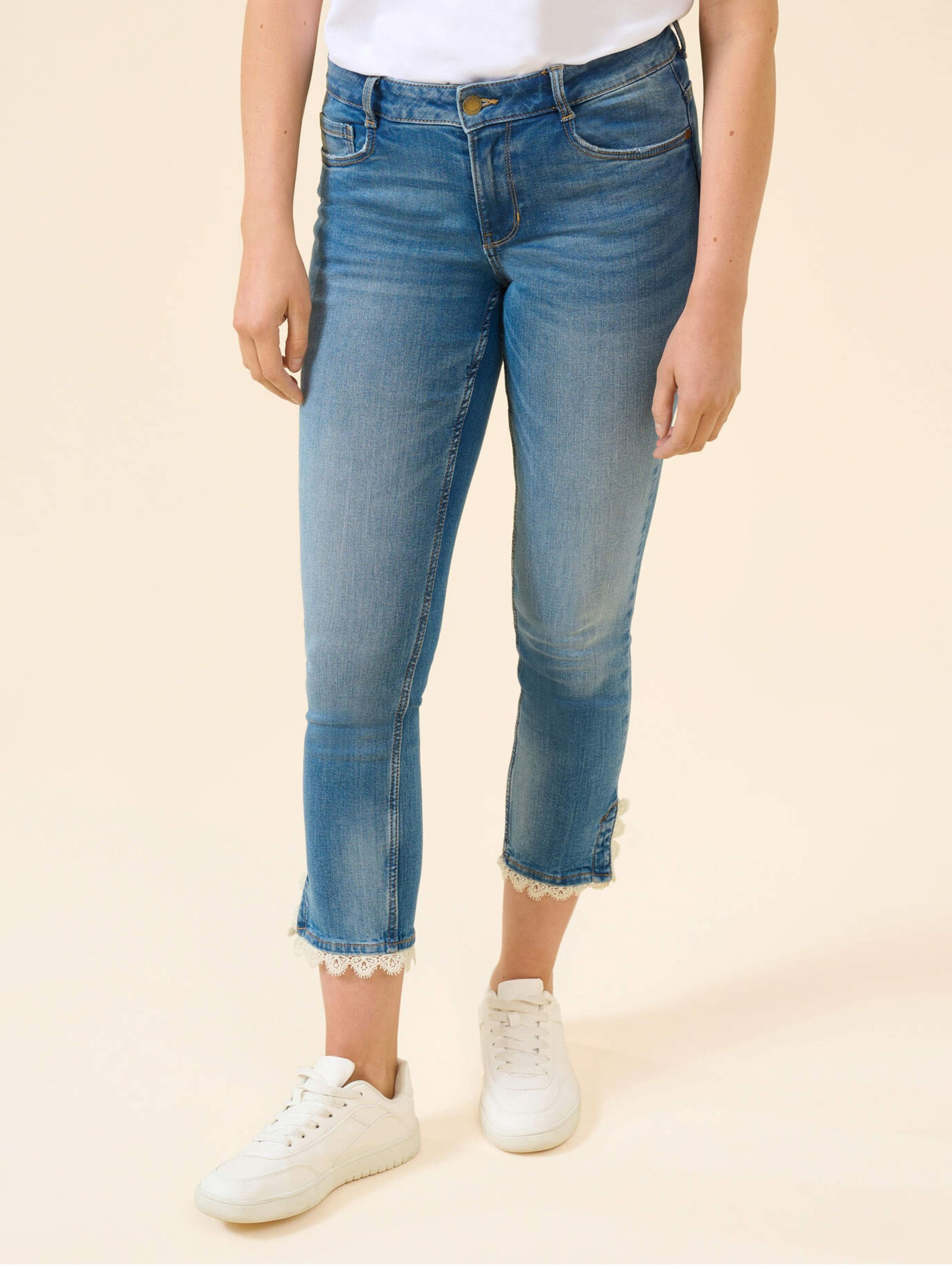 Niebieskie cropped slim fit jeansy ORSAY