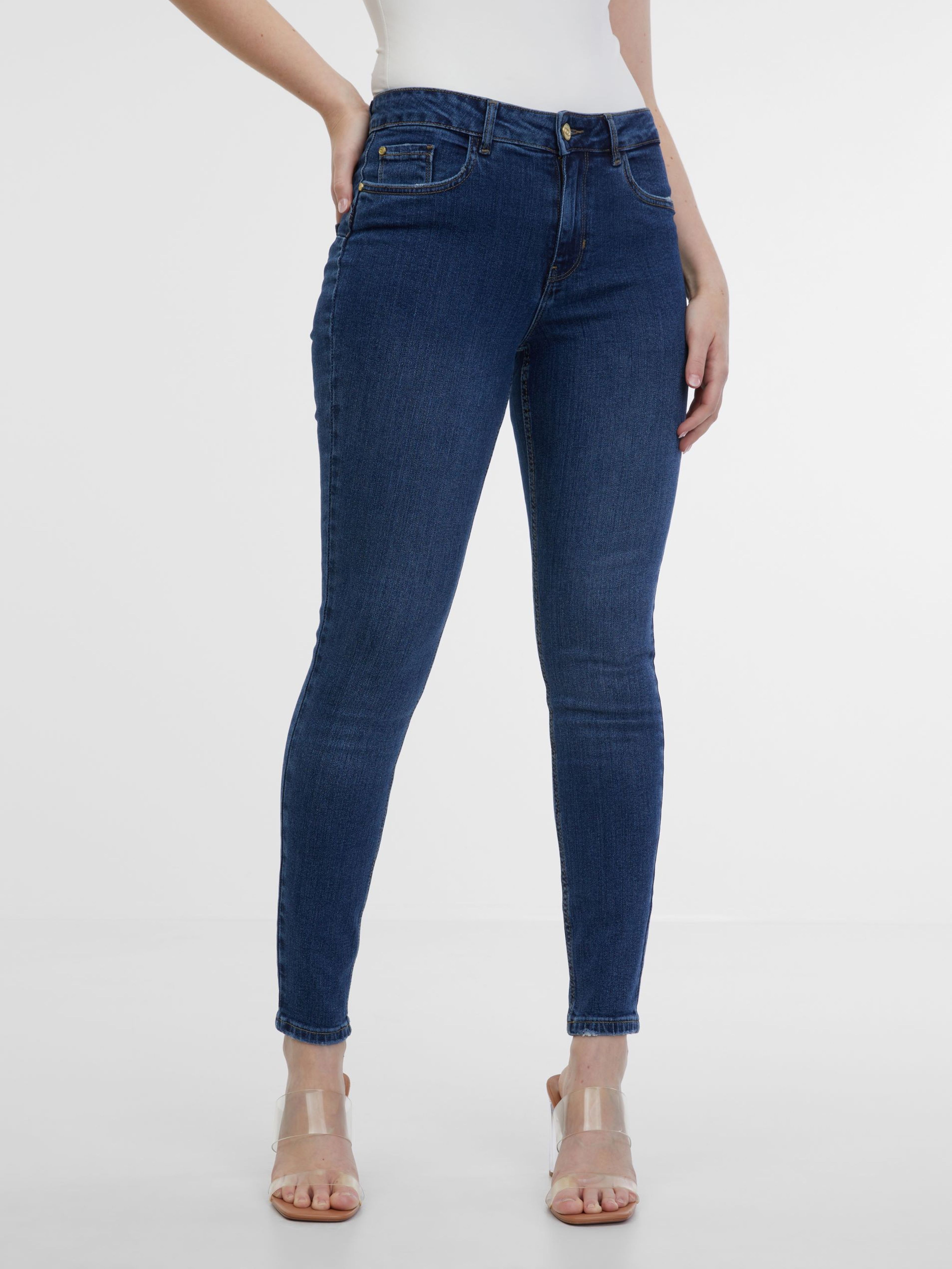 Ciemnoniebieskie jeansy damskie jeggins ORSAY