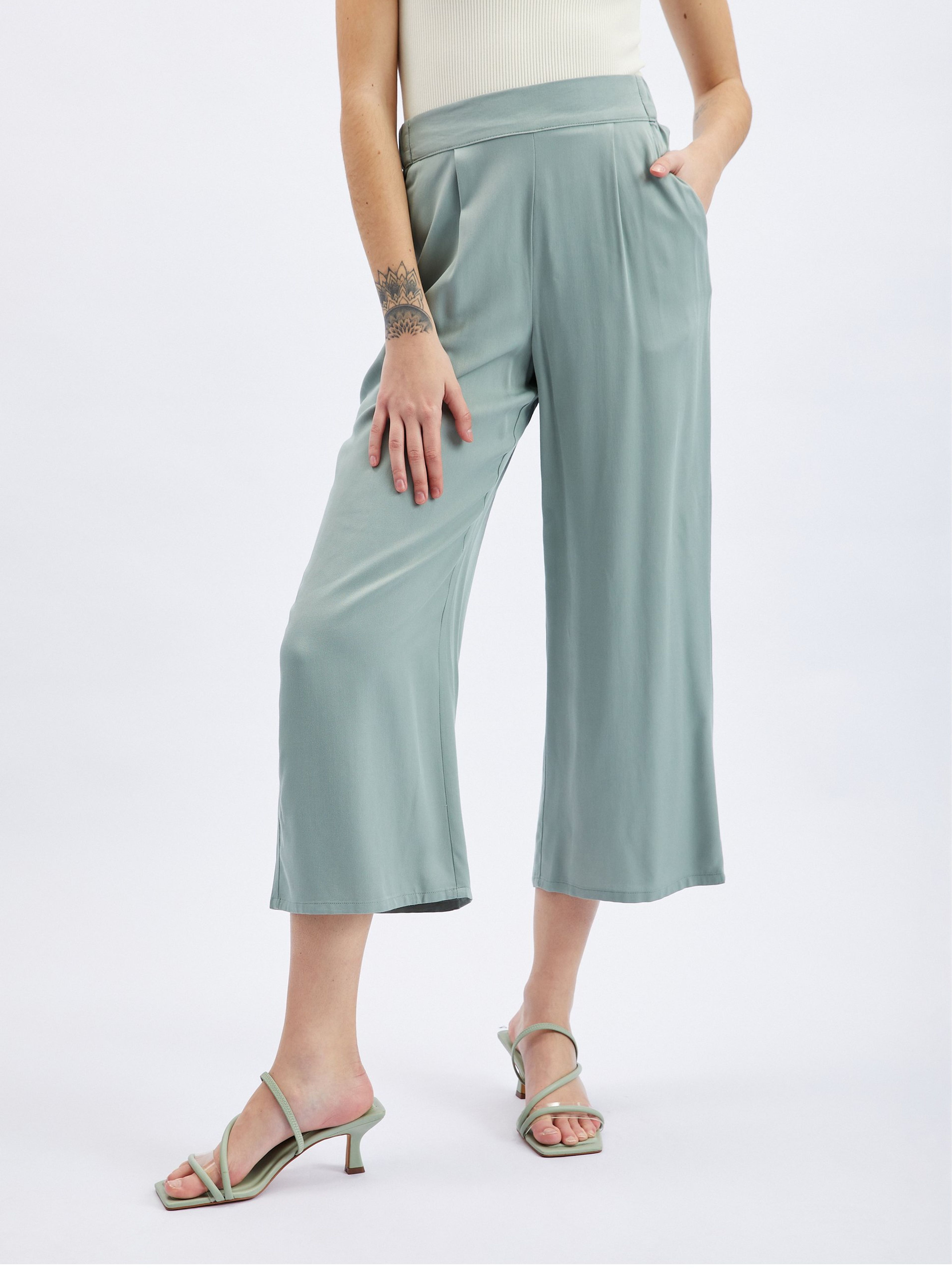 Svetlozelené dámske široké nohavice s prestrihmi ORSAY