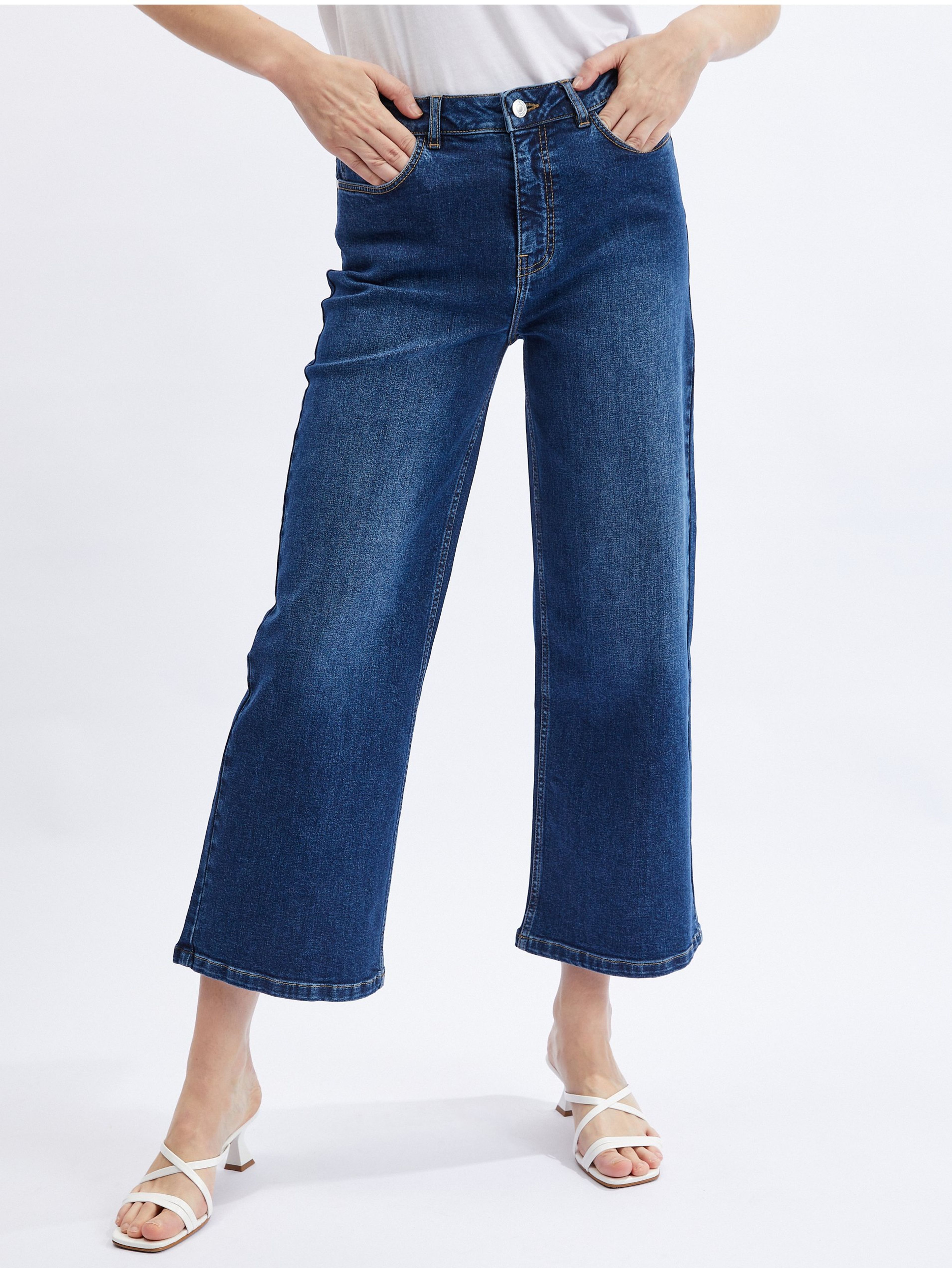 Granatowe jeansy damskie ORSAY z rozszerzanymi nogawkami