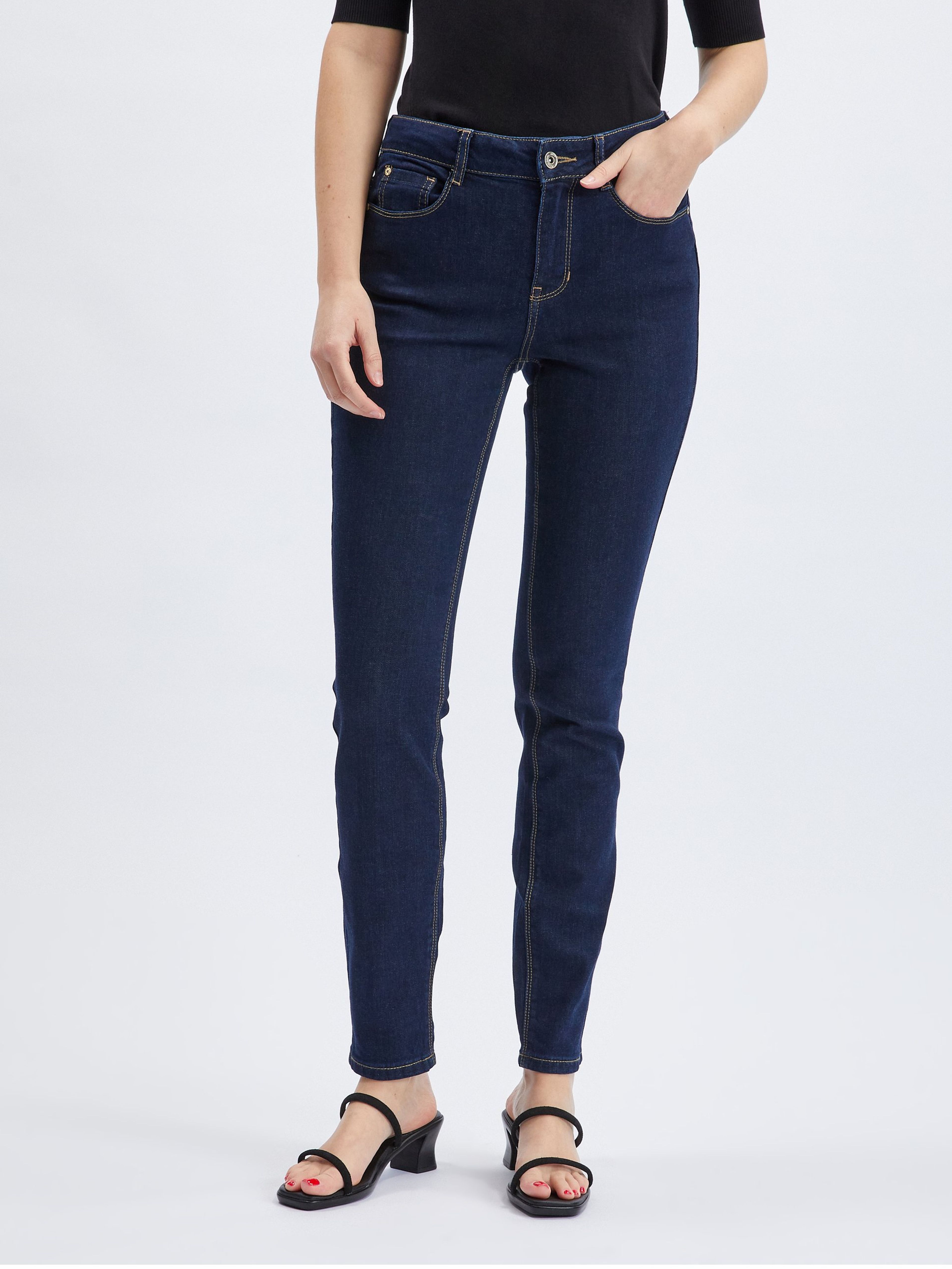 Ciemnoniebieskie jeansy damskie slim fit ORSAY